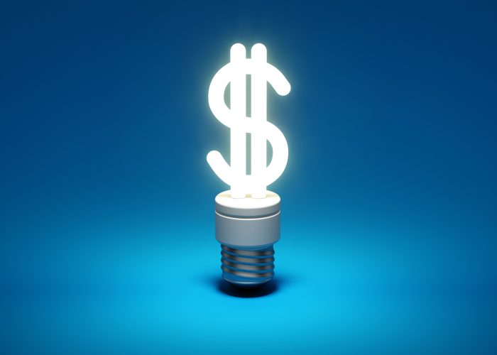 LED Lightbulb that looks like a dollar sign illustrating LEDs energy and cost savings