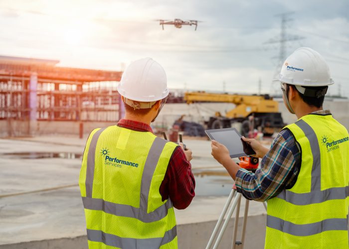 Performance Services Construction Team using Drone and Technology to assist design-build construction project